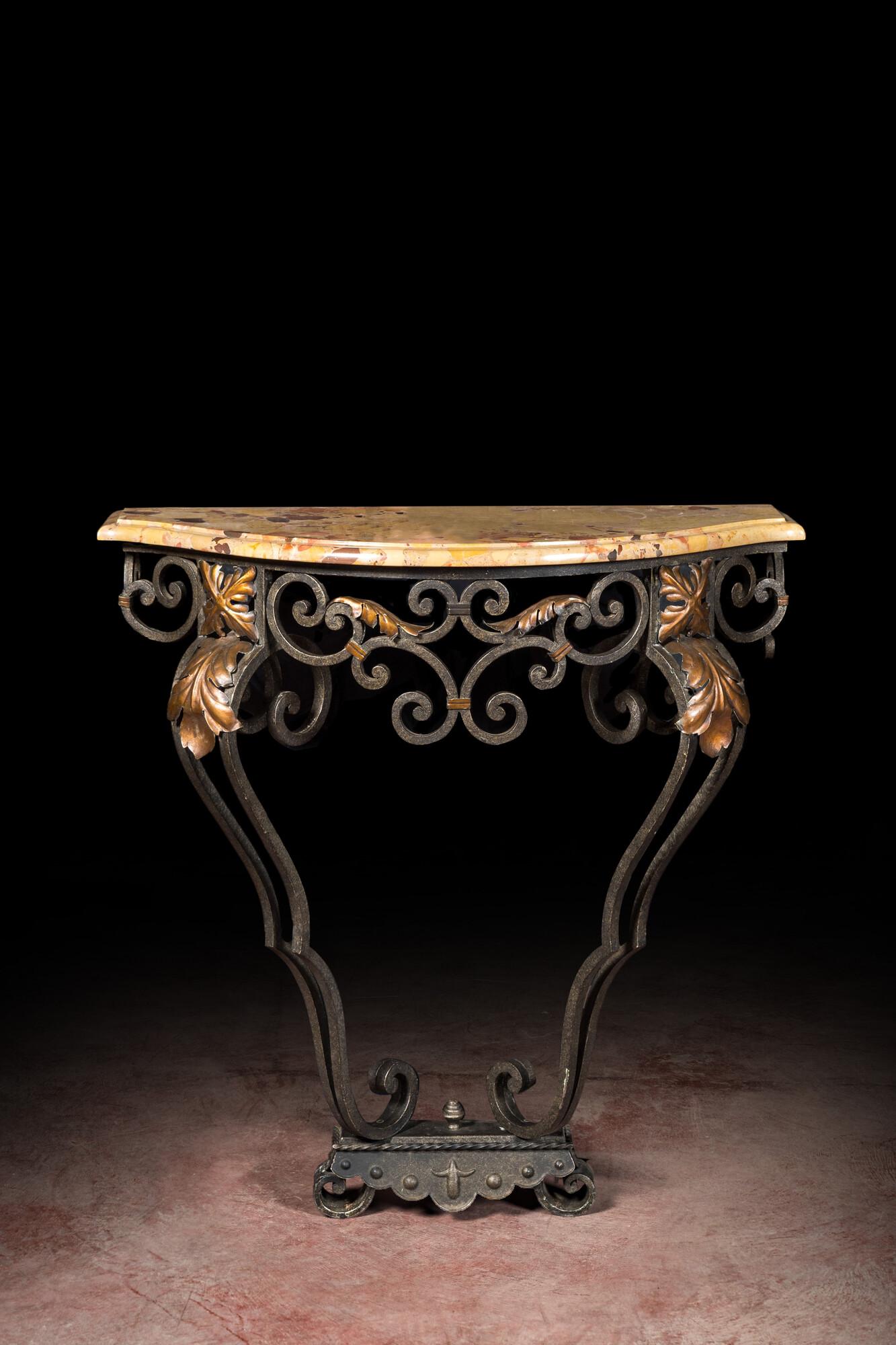 A wrought iron console with marble top, 20th C. (1 of 4)