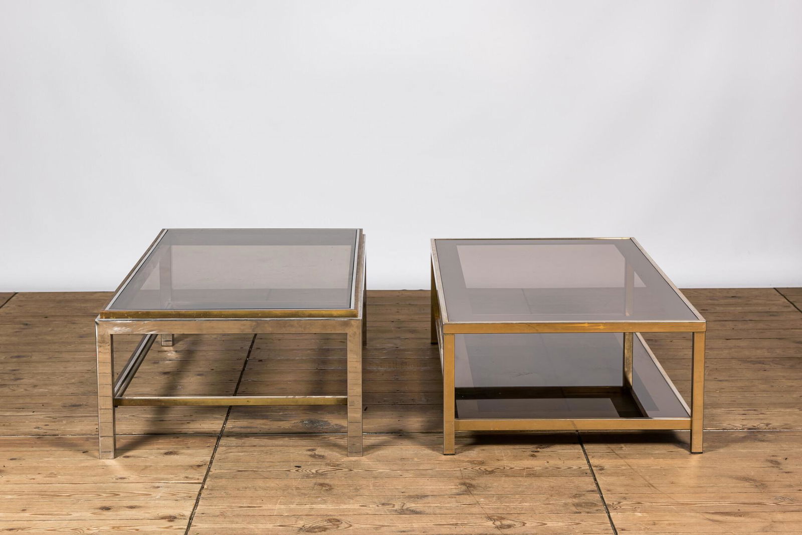Two rectangular chromed brass and glass coffee tables, 20th C. (1 of 7)
