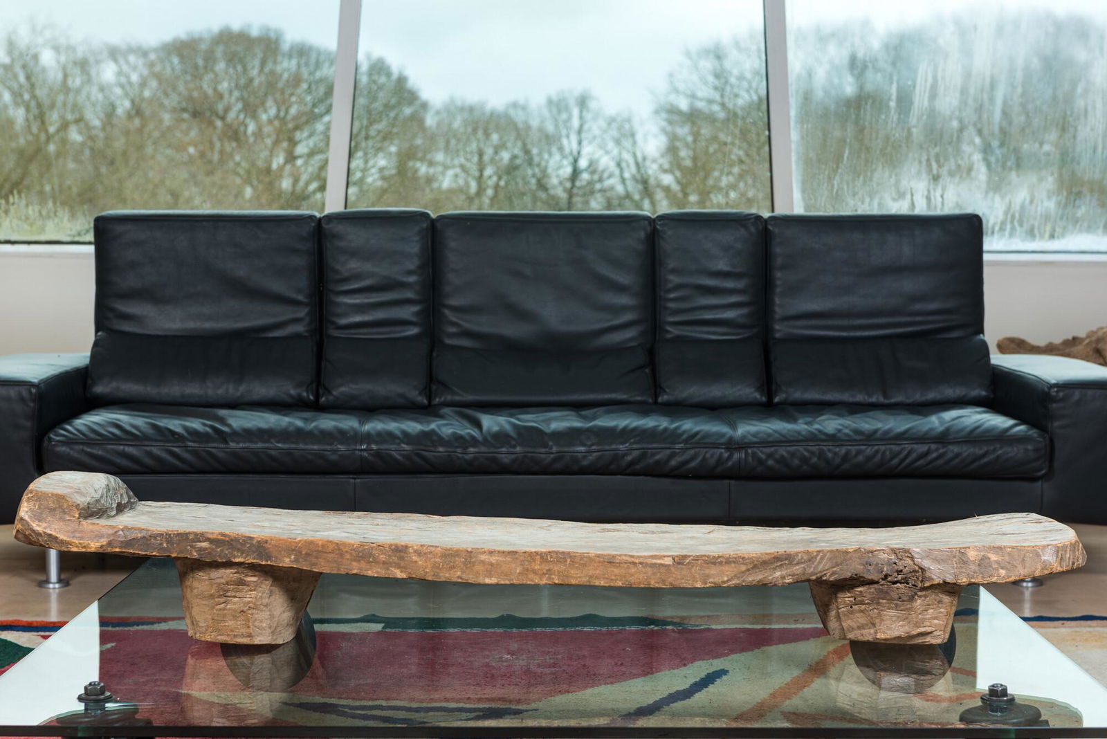 An African wooden Senufo daybed, Ivory Coast, 20th C. (1 of 3)