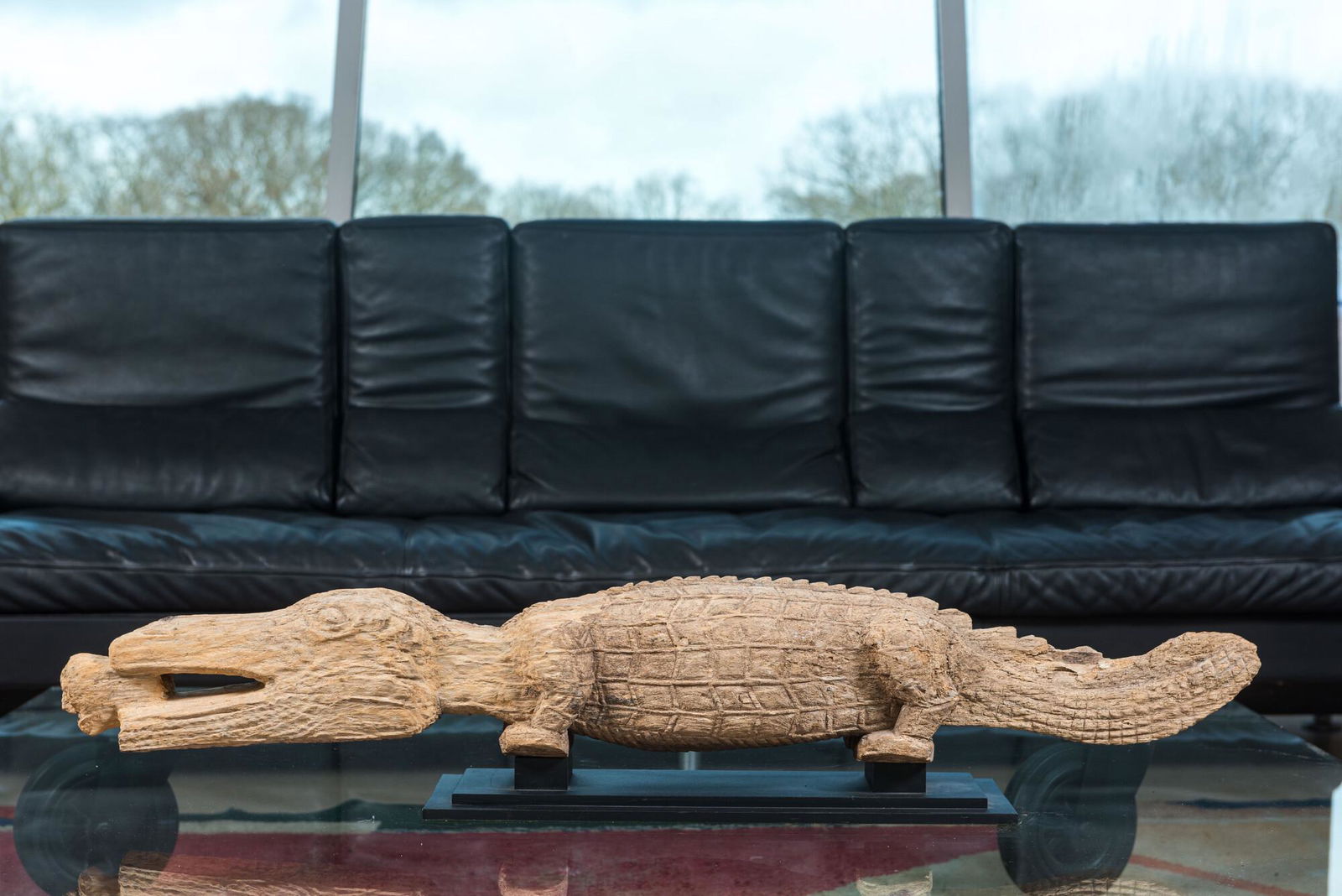 A large African wooden crocodile, 20th C. (1 of 2)