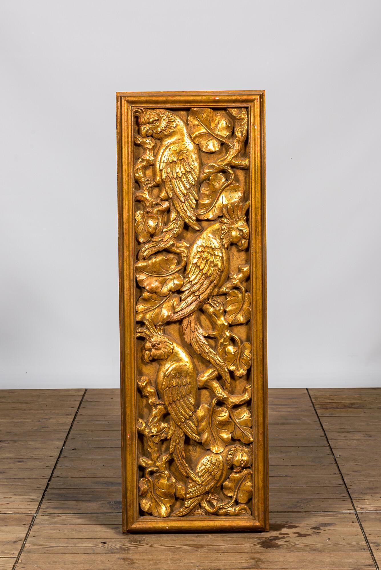 A gilt plaster relief with macaws, 20th C. (1 of 2)