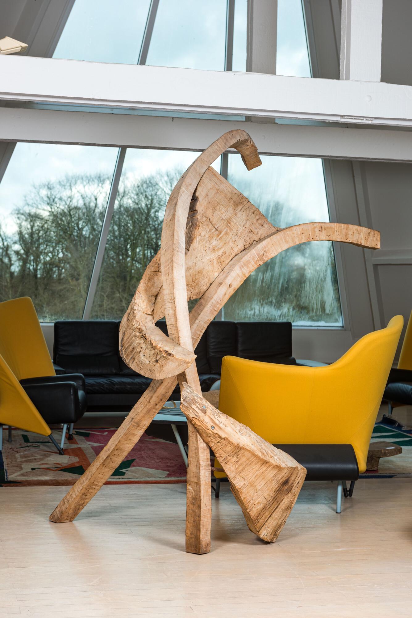 A large abstract carved wood sculpture, 20th C. (1 of 9)