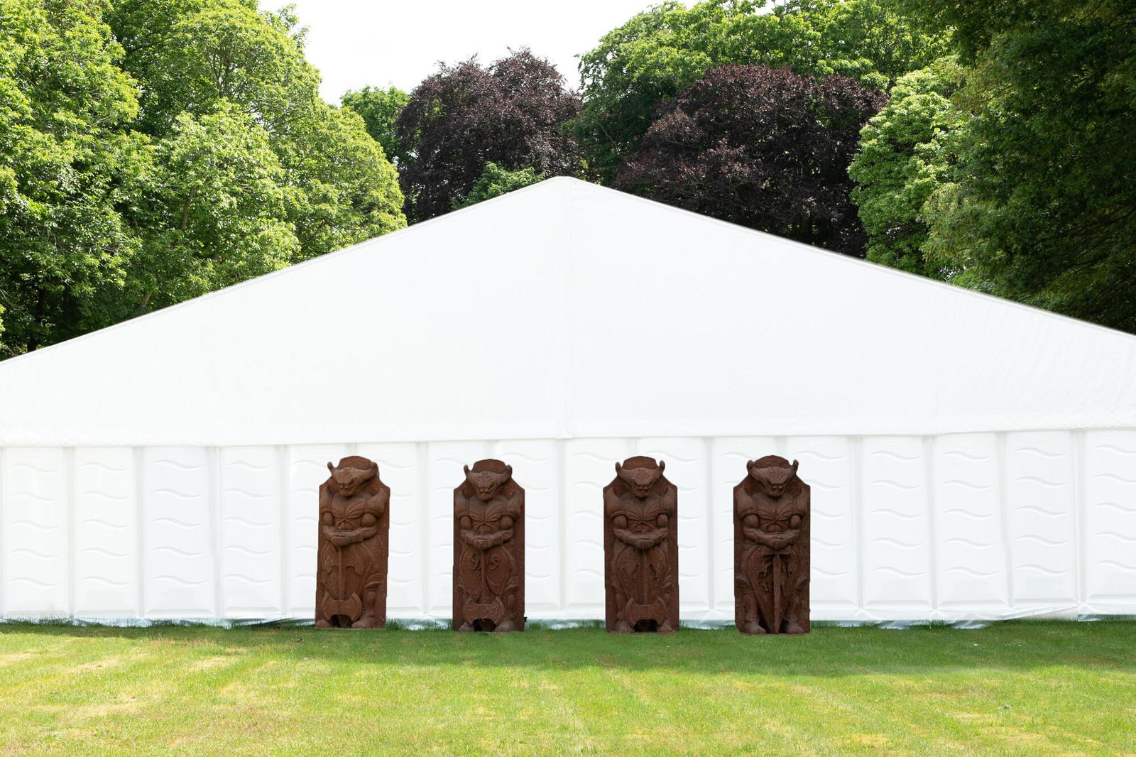 Four large rust-coloured polyester extra-terrestrial guards from a fairground attraction, 2nd half (1 of 6)