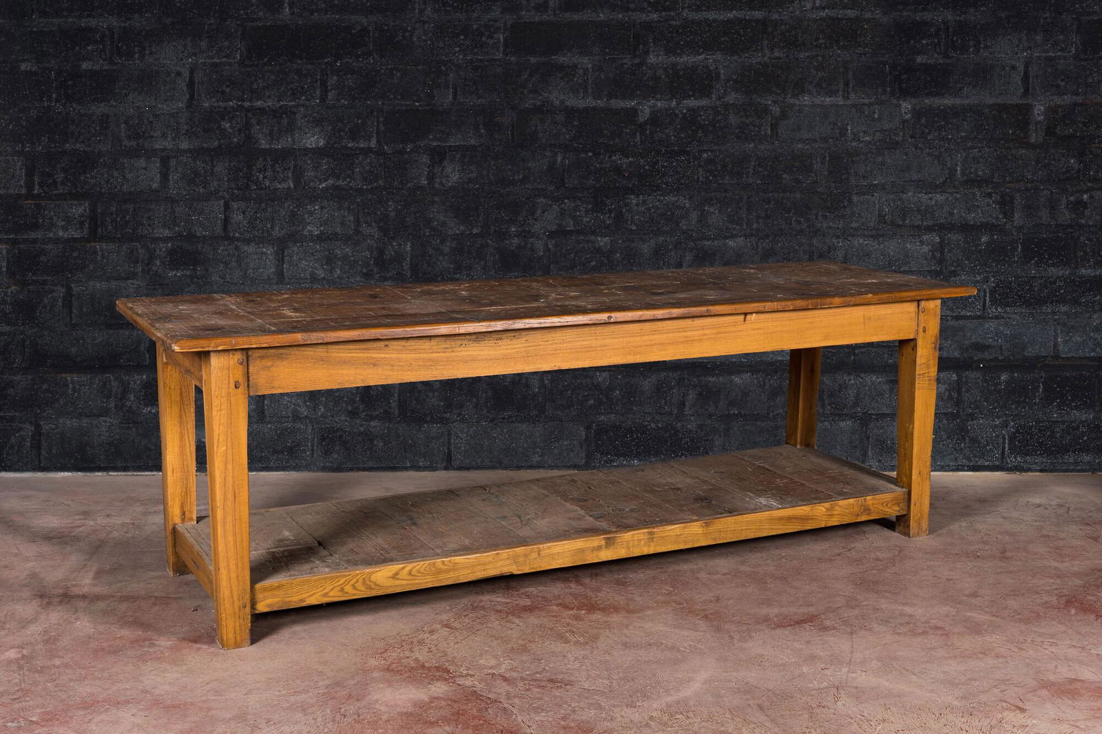 A long working table from a textile workshop in oak and pine, 1st half 20th C. (1 of 2)