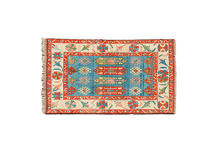 An Oriental woolen rug with floral design and geometric motifs, 20th C. (1 of 3)