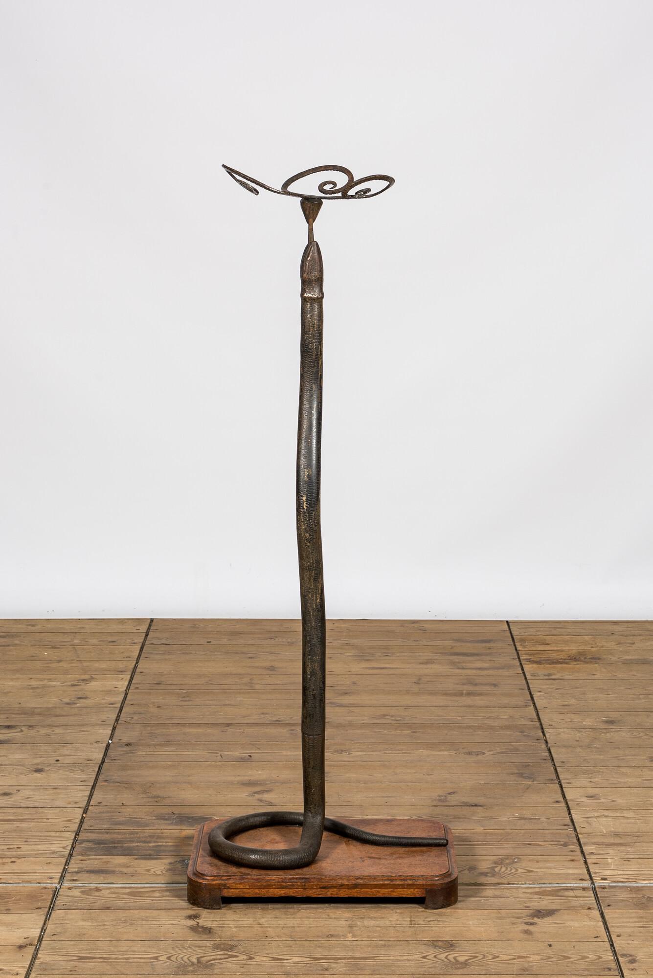 A patinated bronze floor lamp in the shape of a snake, 1st half 20th C. (1 of 3)
