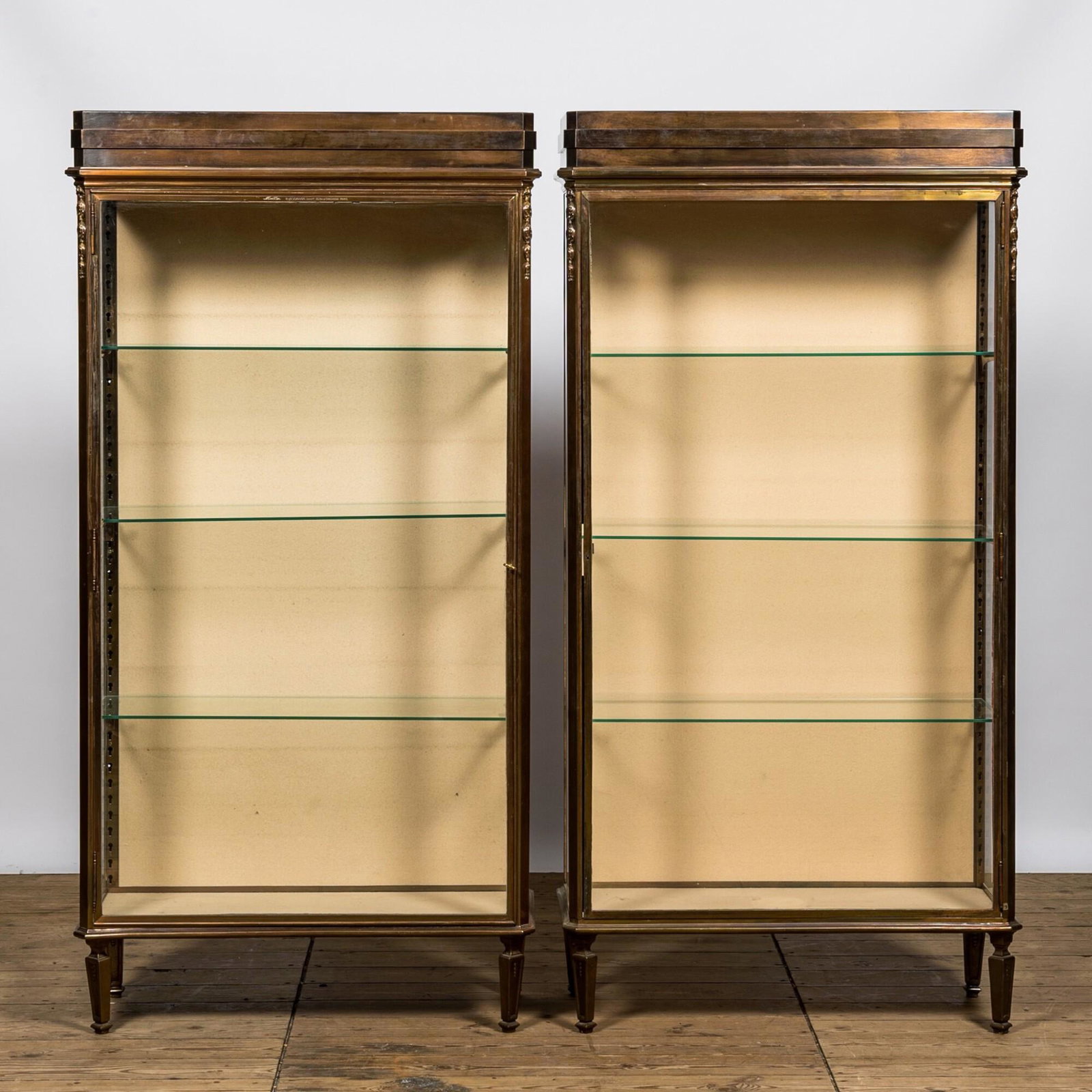 A pair of French brass display cabinets, Muller Paris, 1st half 20th C.: Full title: A pair of French brass display cabinets, Muller Paris, 1st half 20th C. Description: H 175 x L 89 x D 37 cm About this sale: Paul De Grande is one of the major dealers of antique furniture