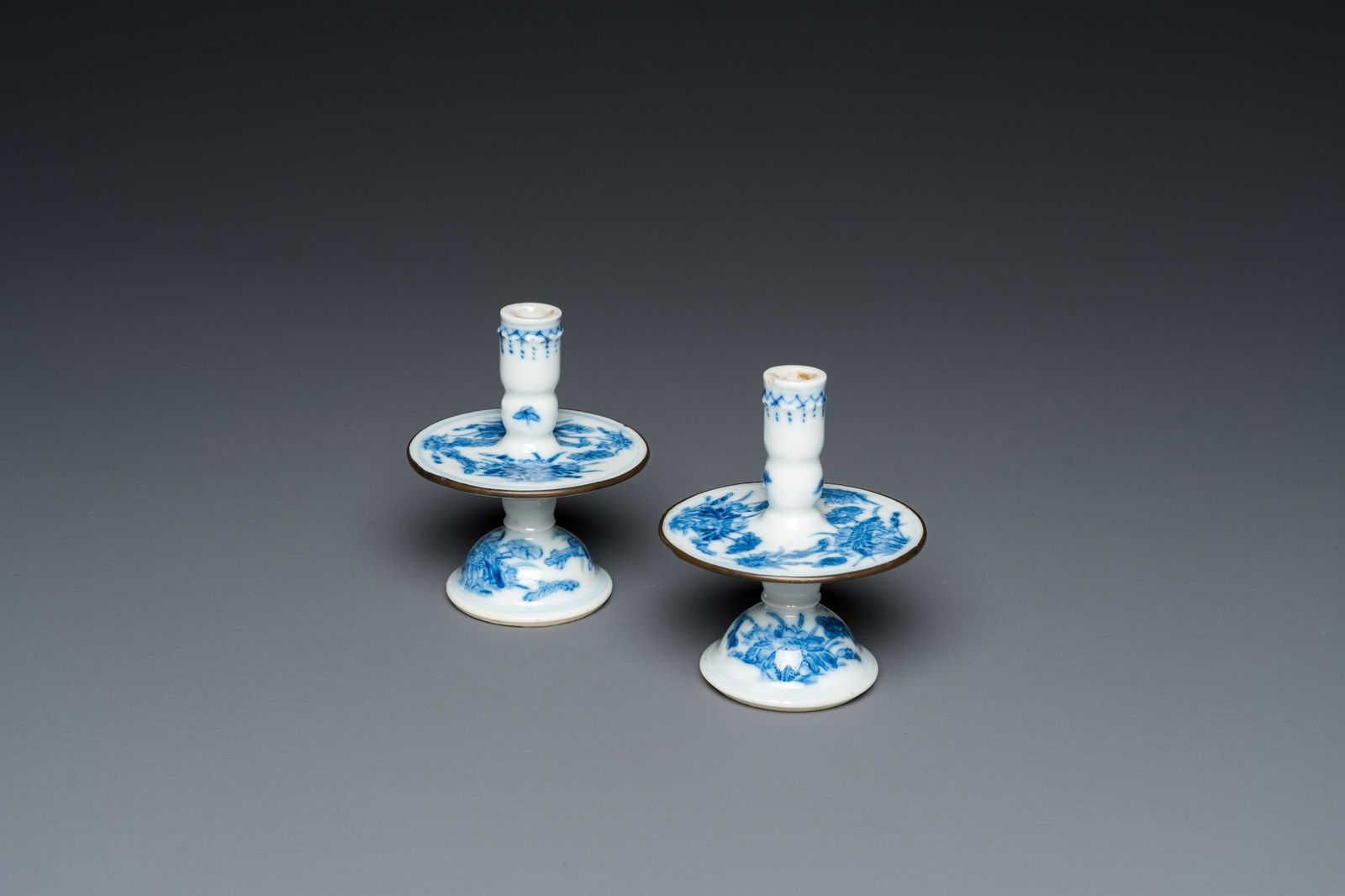 A pair of Chinese blue and white 'Bleu de Hue' candlesticks for the Vietnamese market, four (1 of 18)