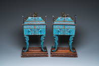 A pair of large Chinese cloisonn&#233; 'fangding' censers and covers on wooden stands, 19th C.
