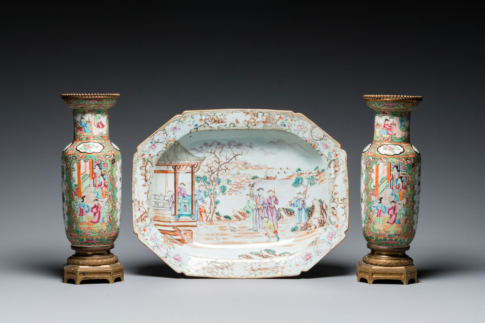 A Chinese octagonal famille rose 'mandarin' dish and a pair of bronze-mounted Canton vases, Qianlong (1 of 9)