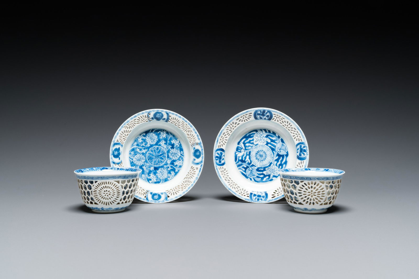 A pair of Chinese blue and white reticulated double-walled cups and saucers, Kangxi (1 of 20)