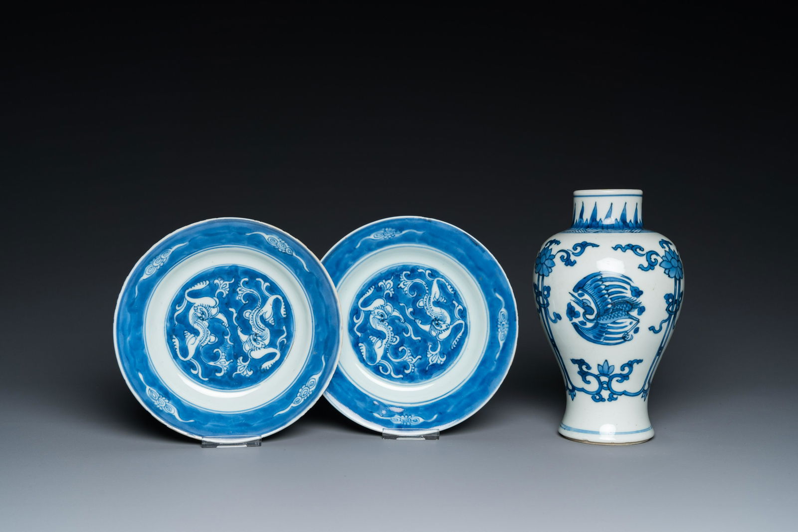 A Chinese blue and white 'cranes' vase and a pair of plates, Kangxi (1 of 9)