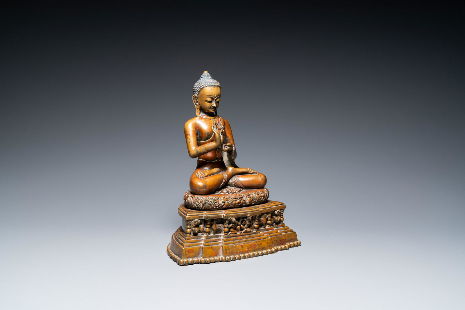 A large Tibetan brass and copper Buddha on throne, probably 16th C. (1 of 20)