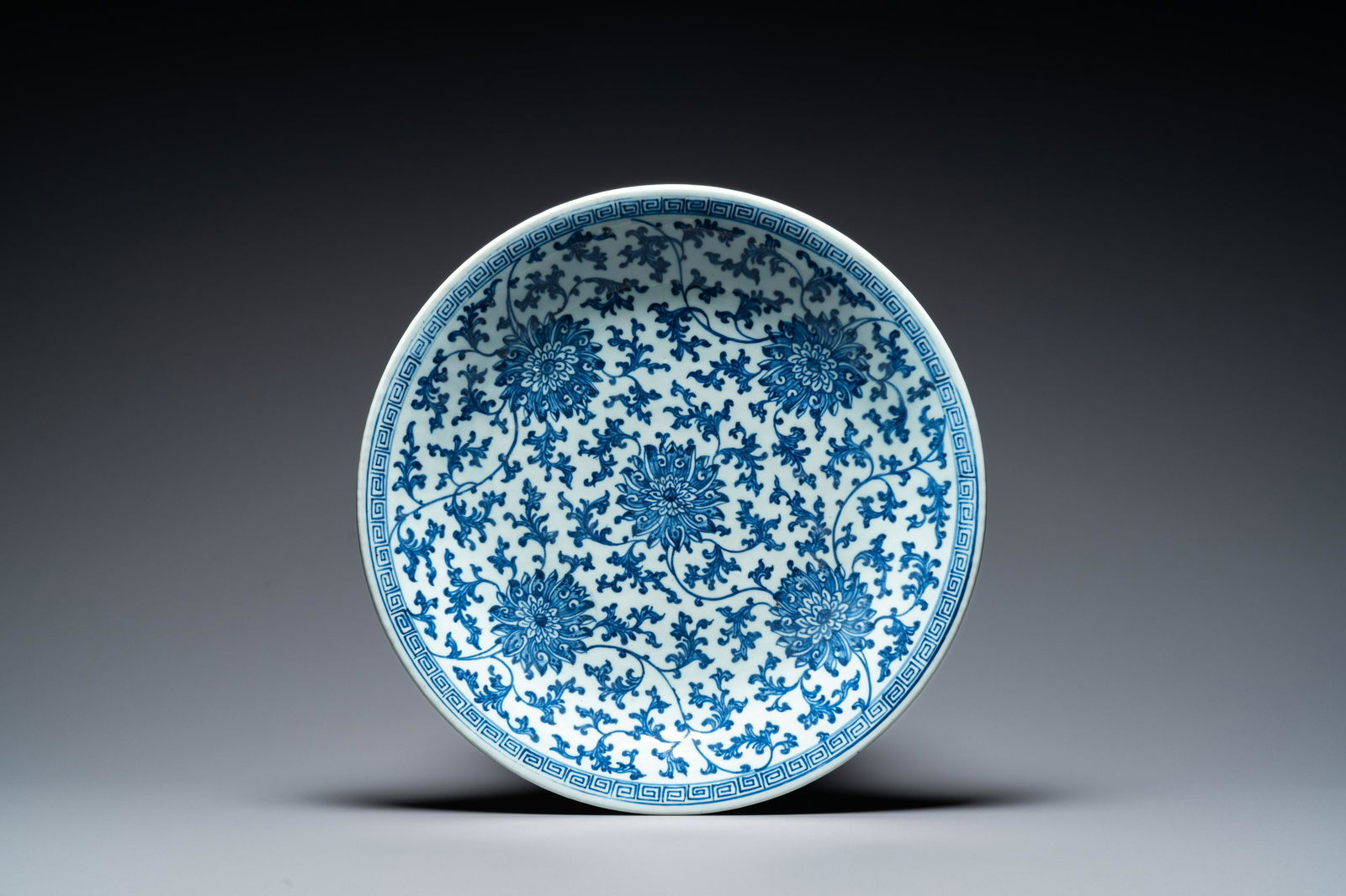A Chinese blue and white 'lotus' dish, Qianlong mark and of the period (1 of 12)