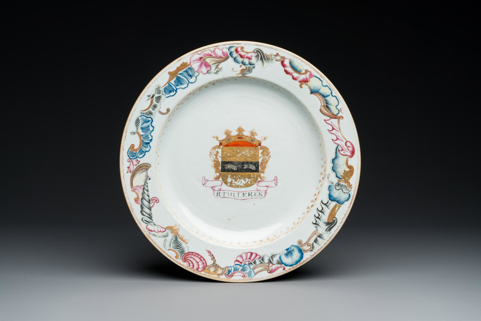 A Chinese famille rose armorial dish for the Dutch market with the arms of 'Tulleken', Qianlong: Dia.: 32 cm