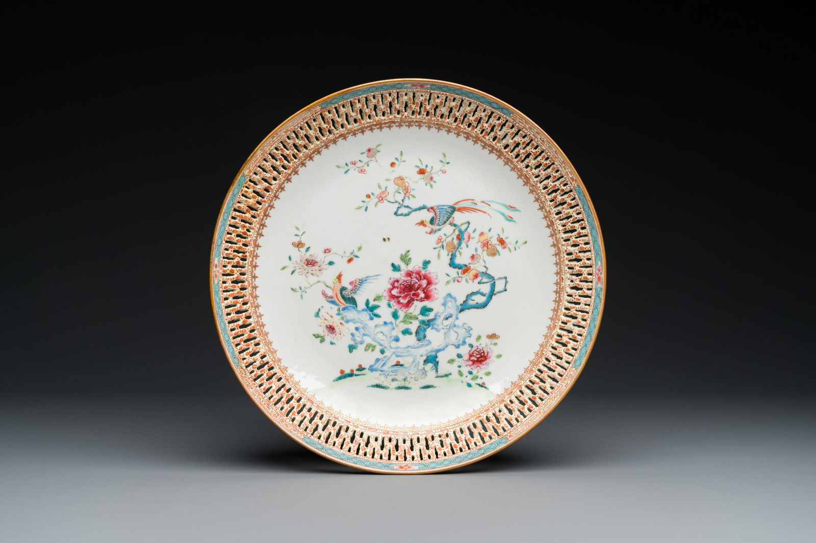 A Chinese famille rose dish with reticulated border, Qianlong (1 of 2)