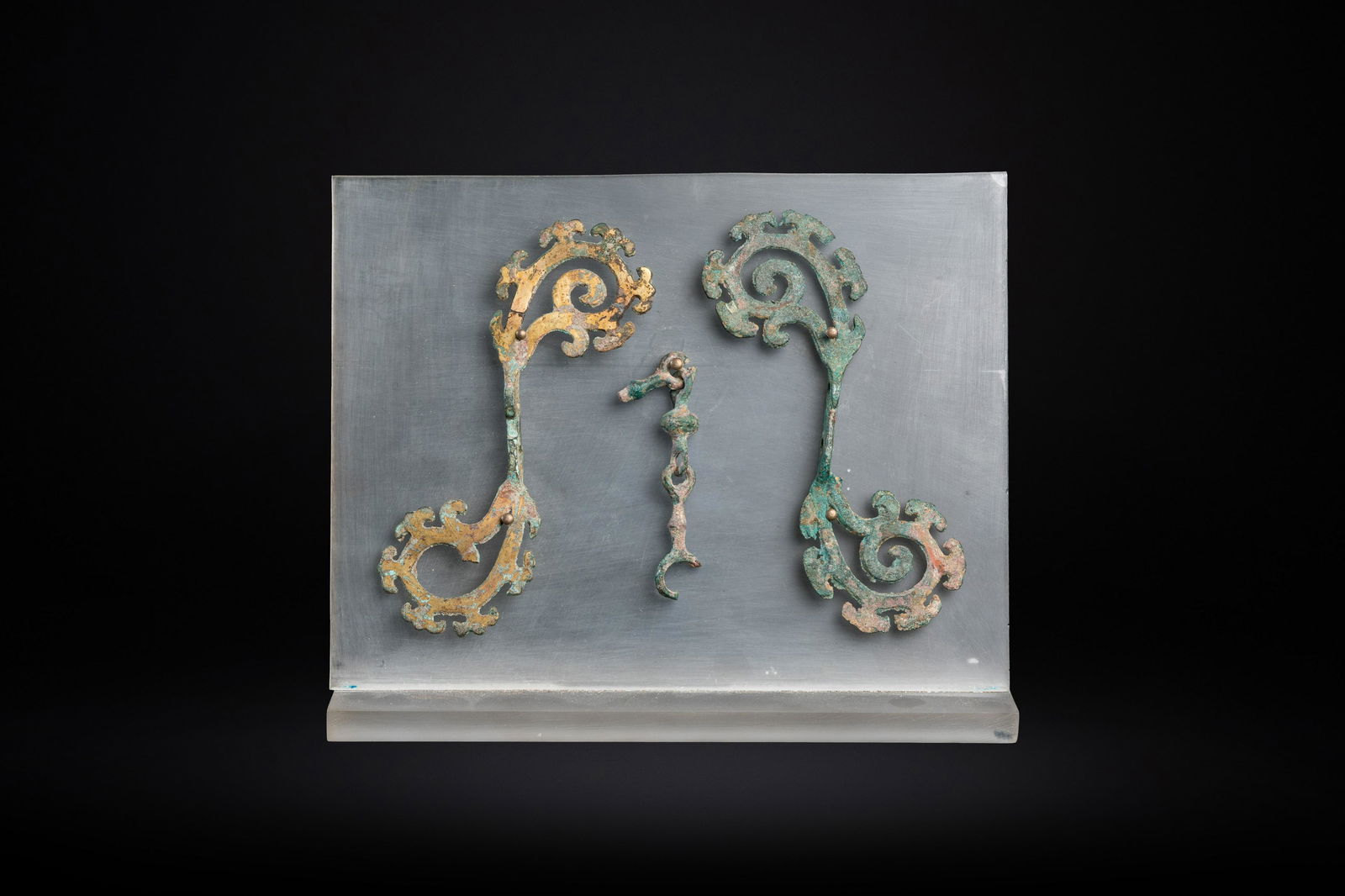 A pair of Chinese gilt bronze bridle ornaments, probably Han (1 of 3)