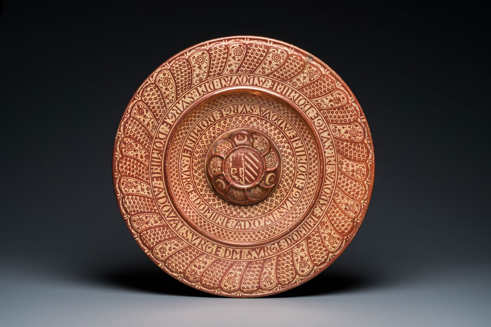 A large Hispano-Moresque lustre-glazed dish with royal alliance arms, Manises, Spain, 19th C. (1 of 2)