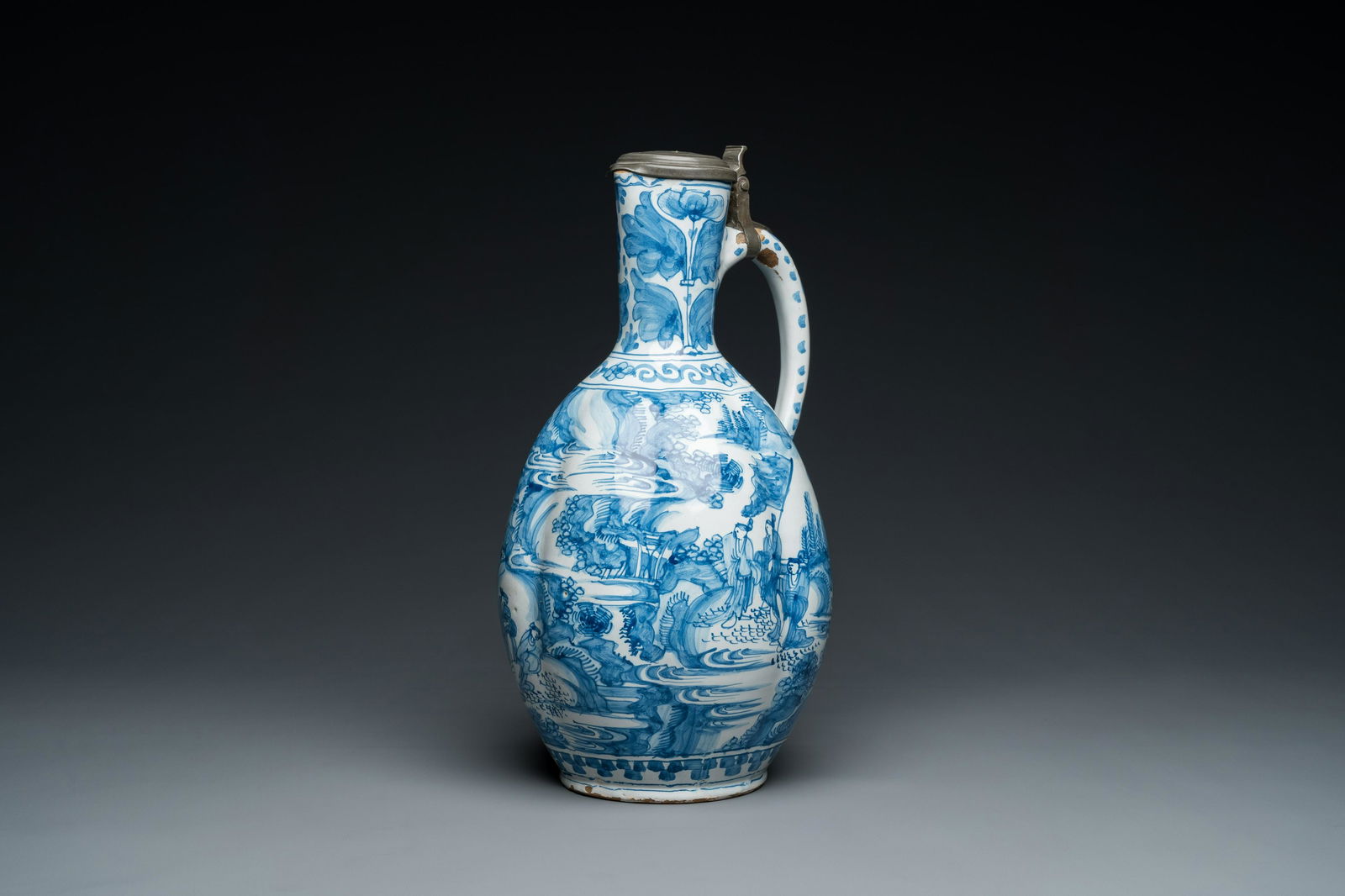 A large twisted Dutch Delft blue and white pewter-mounted ewer, 17th C. (1 of 9)