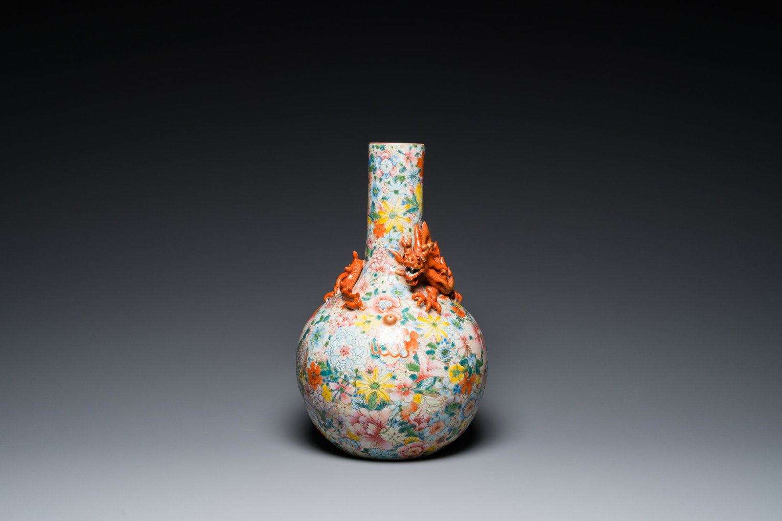 A Chinese famille rose 'millefleurs' bottle vase, Qianlong mark, Republic: Full title: A Chinese famille rose 'millefleurs' bottle vase, Qianlong mark, Republic Description: H.: 40 cm