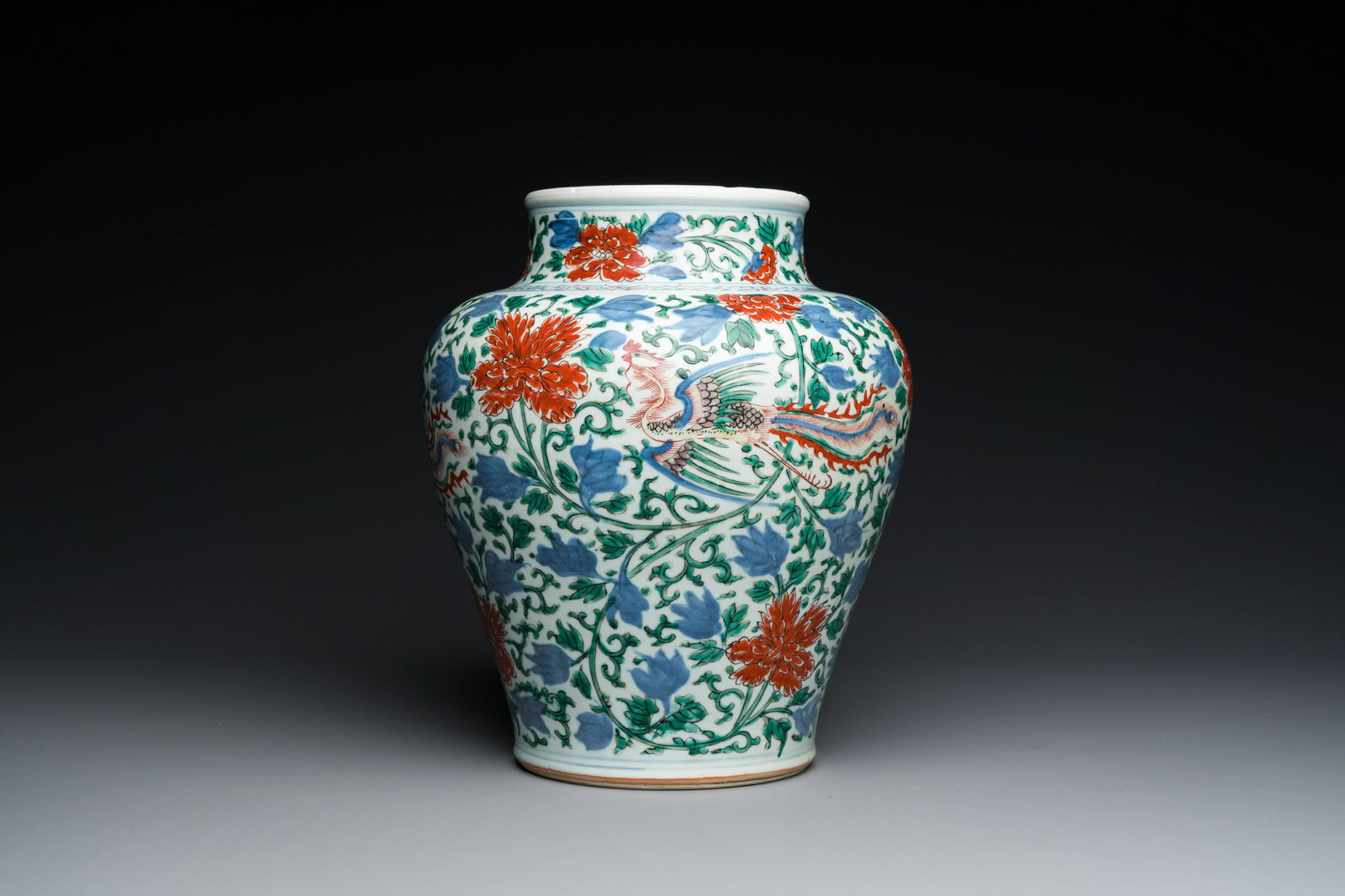 A Chinese wucai 'phoenix and peony scrolls' vase, Transitional period (1 of 6)