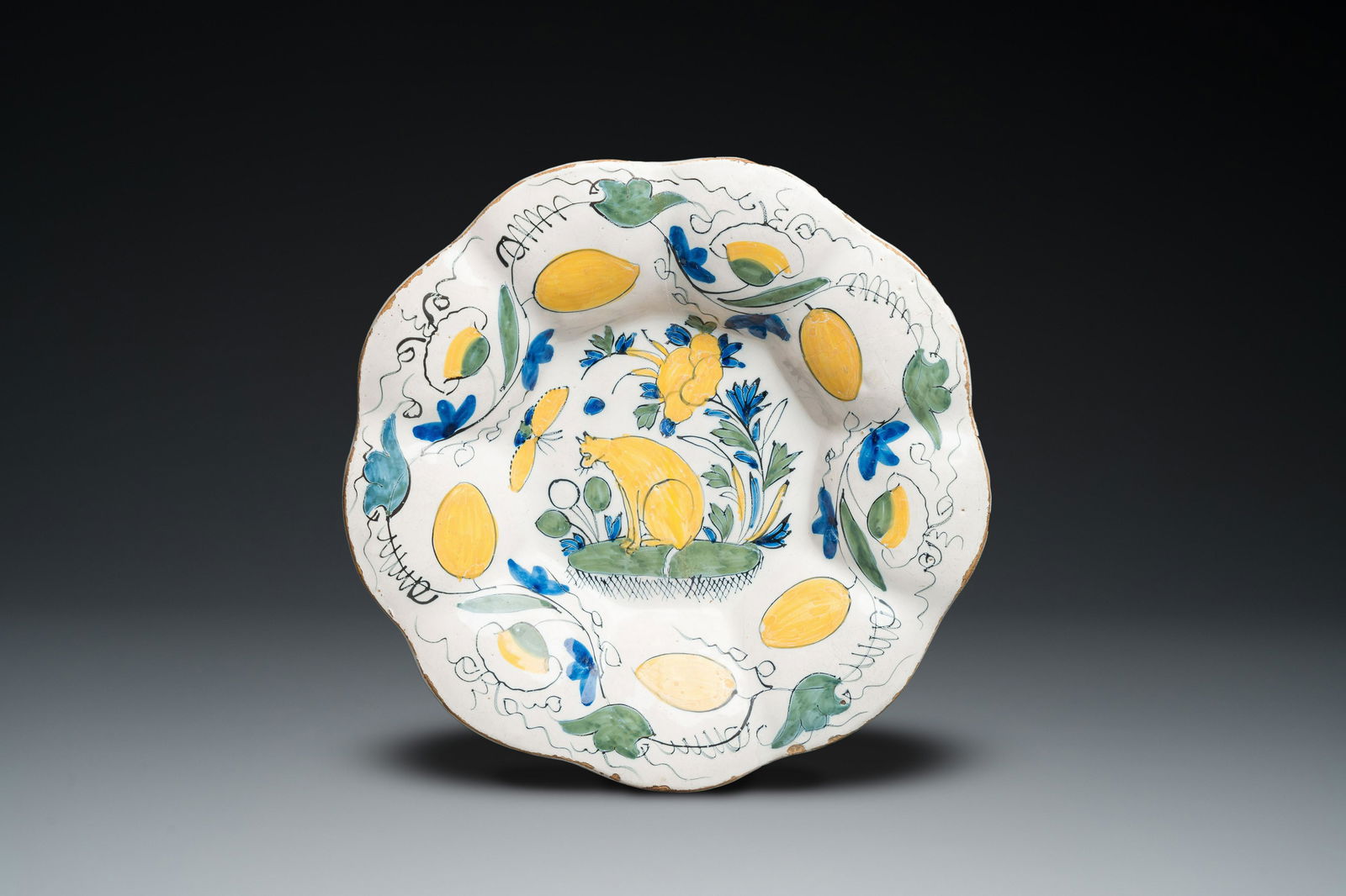 A polychrome Dutch Delft lobed 'cat' dish, late 17th C. (1 of 2)