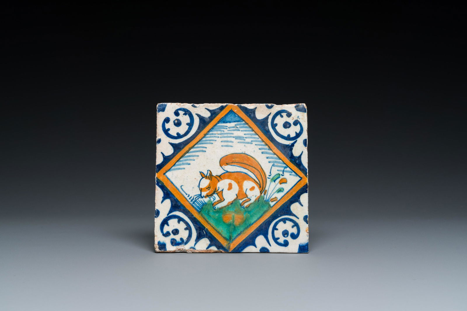 A polychrome Dutch maiolica tile with a squirrel, ca. 1600 (1 of 2)