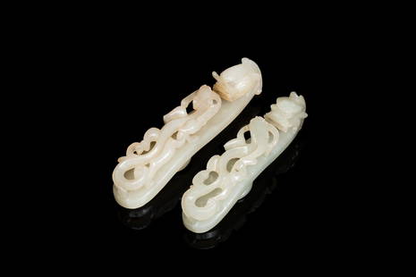 Two Chinese white jade fine carved belt hooks, Qing: Full title: Two Chinese white jade fine carved belt hooks, Qing Description: L.: 9,5 cm (the largest) Provenance: - The collection of a Belgian connoisseur. Condition: The absence of a