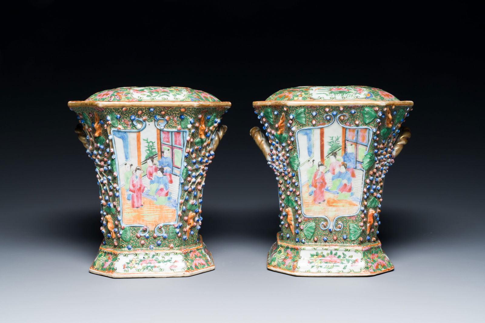 A pair of Chinese Canton famille rose flower holders and covers, 19th C. (1 of 6)