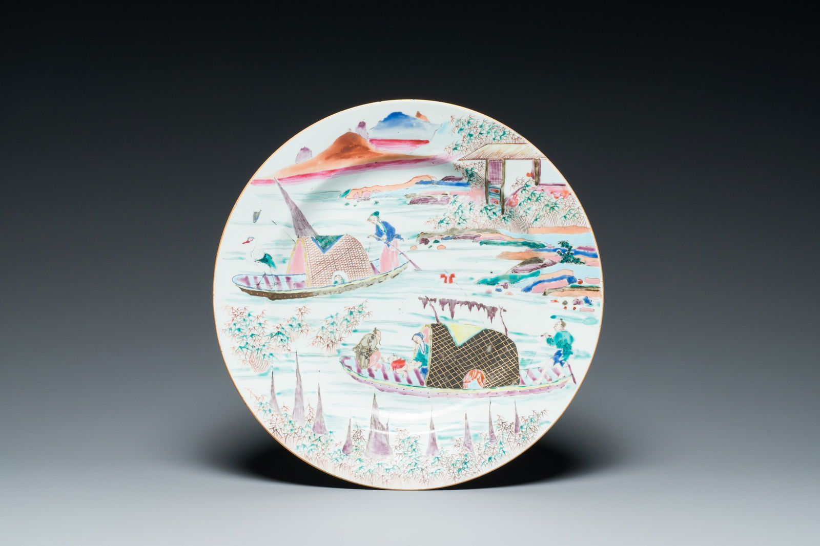 A Chinese famille rose 'fishermen in a sampan' dish, Yongzheng/Qianlong (1 of 2)