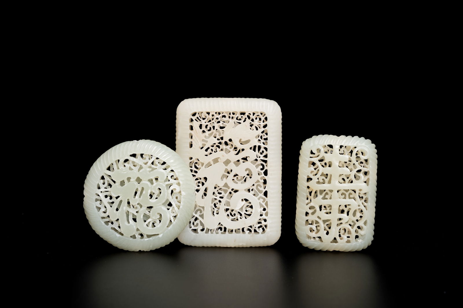 Three Chinese reticulated white jade carvings, Qing (1 of 7)