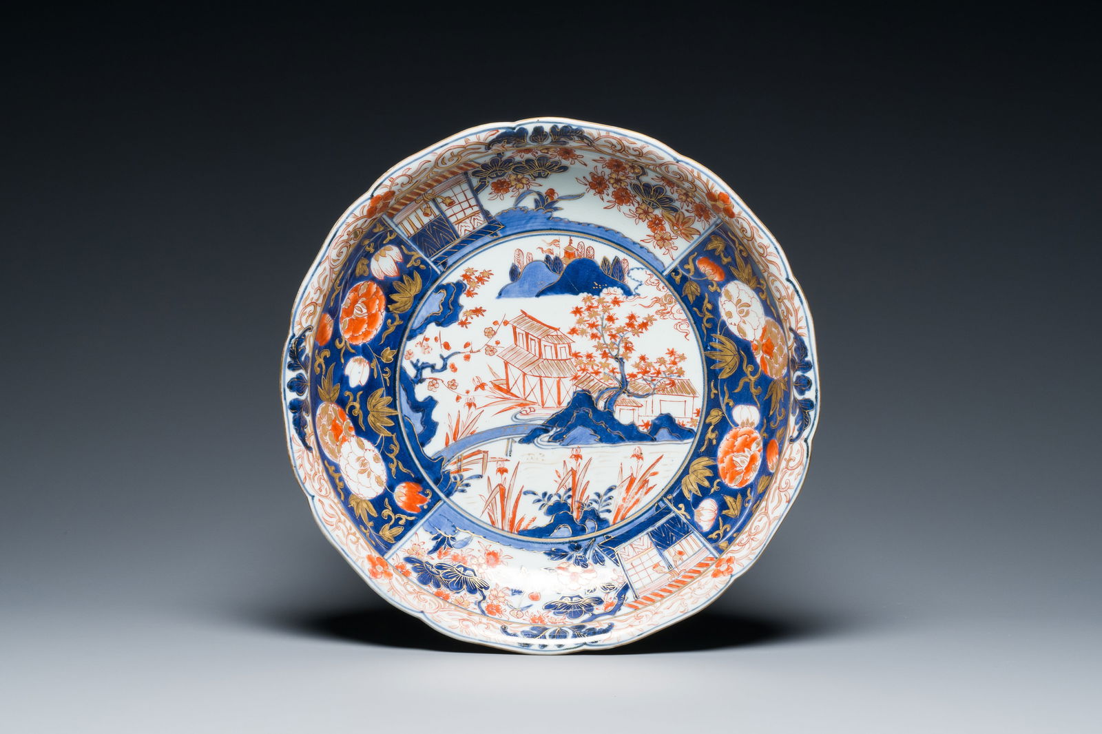A Japanese Imari 'landscape' dish, Edo, 17th C. (1 of 2)