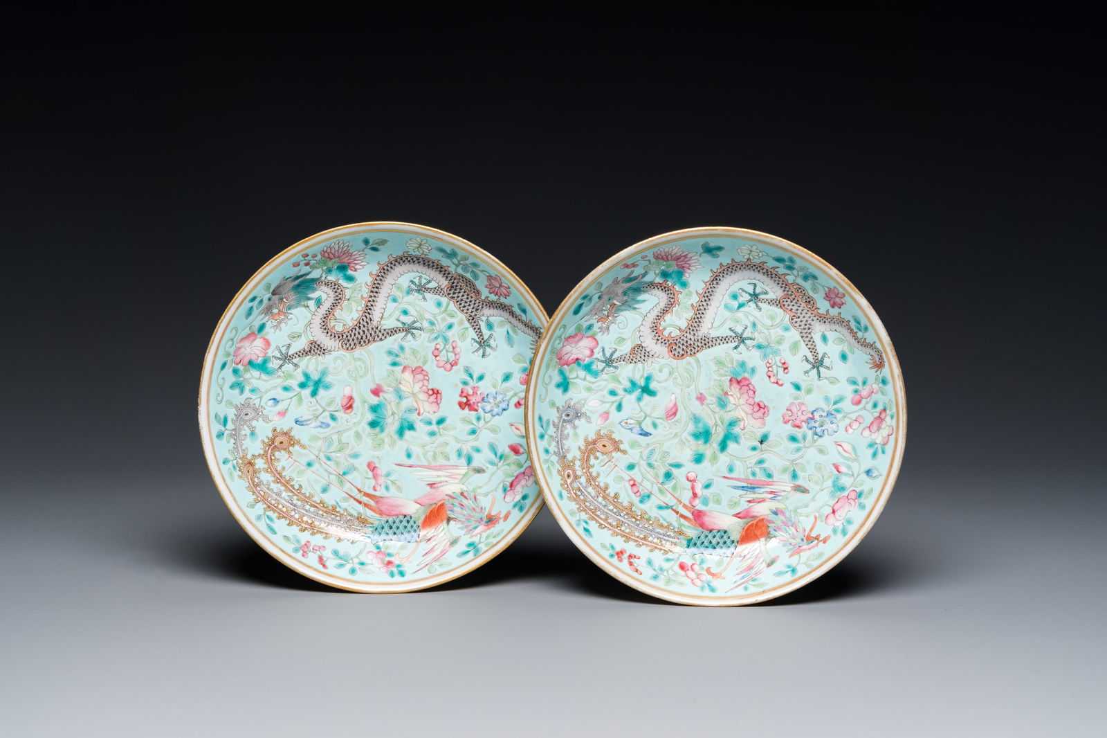 A pair of Chinese famille rose 'dragon and phoenix' saucer dishes, Guangxu mark and of the period (1 of 3)