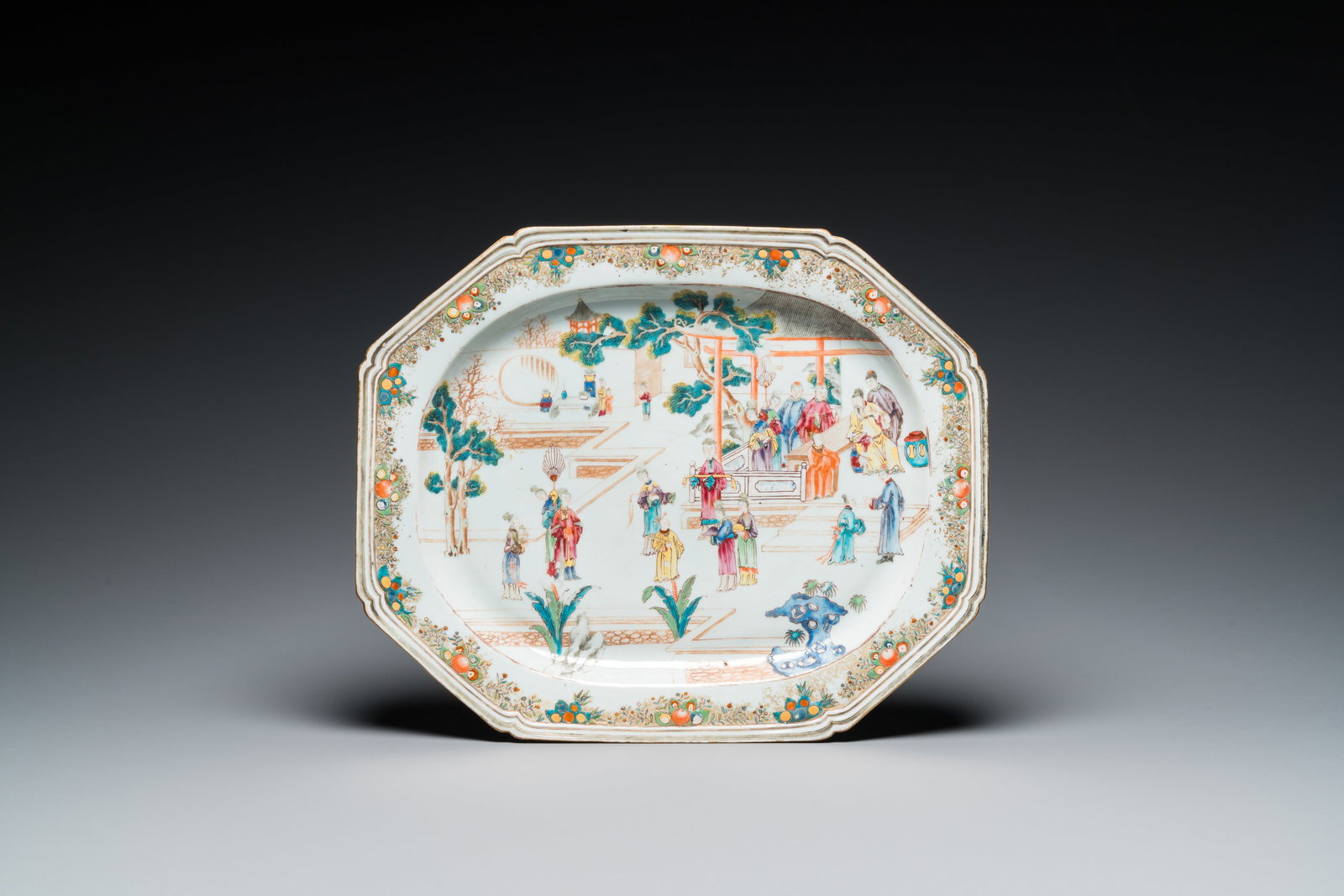 A large Chinese octagonal famille rose 'mandarin subject' dish, Qianlong: Full title: A large Chinese octagonal famille rose 'mandarin subject' dish, Qianlong Description: L.: 40 cm