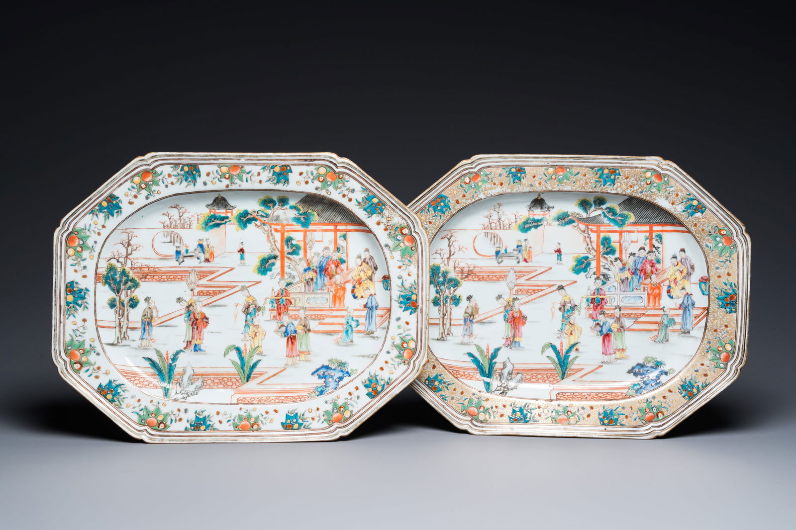 A pair of Chinese octagonal famille rose 'mandarin subject' dishes, Qianlong (1 of 3)