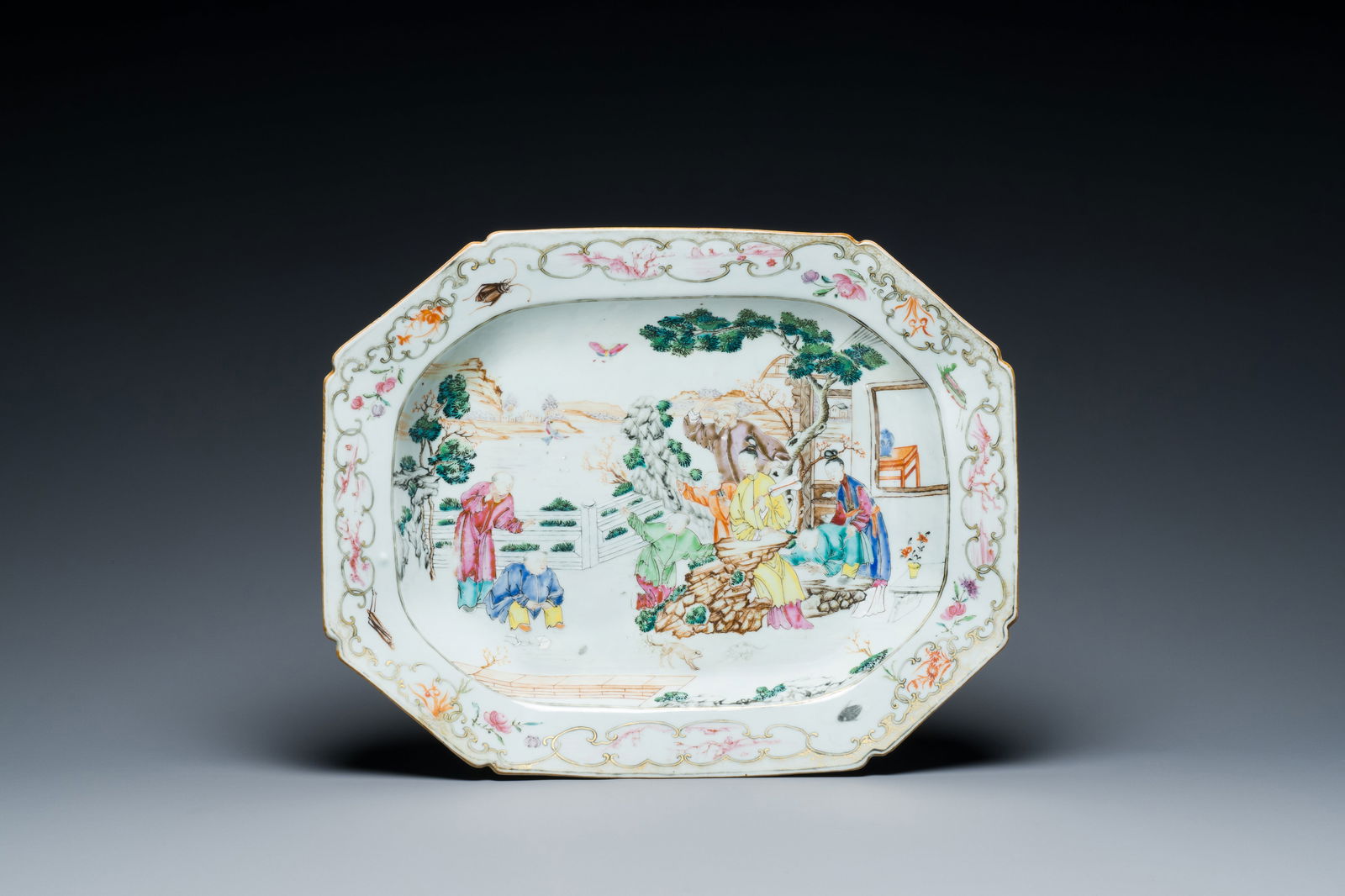 A Chinese octagonal famille rose 'mandarin subject' dish, Qianlong: Full title: A Chinese octagonal famille rose 'mandarin subject' dish, Qianlong Description: Dim.: 37,5 cm x 30 cm