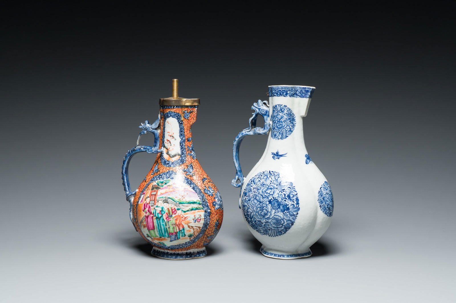A Chinese famille rose 'mandarin subject' dragon-handled ewer and a blue and white 'floral (1 of 7)