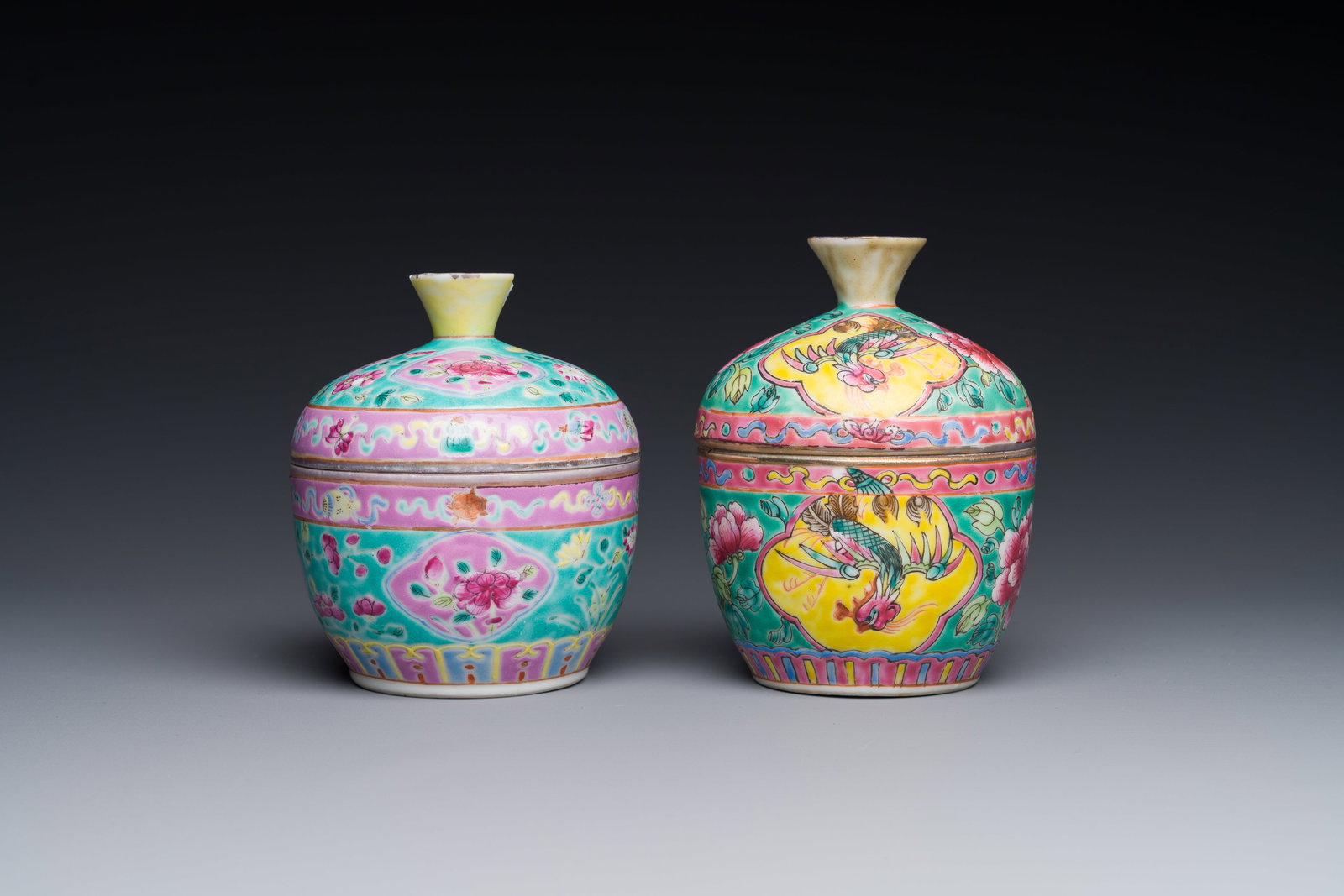 Two Chinese famille rose 'chupu' bowls and covers for the Straits or Peranakan market, Tongzhi mark: Two Chinese famille rose 'chupu' bowls and covers for the Straits or Peranakan market, Tongzhi mark and of the period Dia.: 10 cm - H.: 13 cm Dia.: 10,3 cm - H.: 12 cm