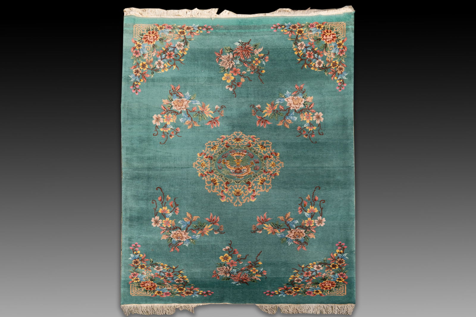 A large Chinese emerald-green-ground carpet with floral design, Republic (1 of 5)