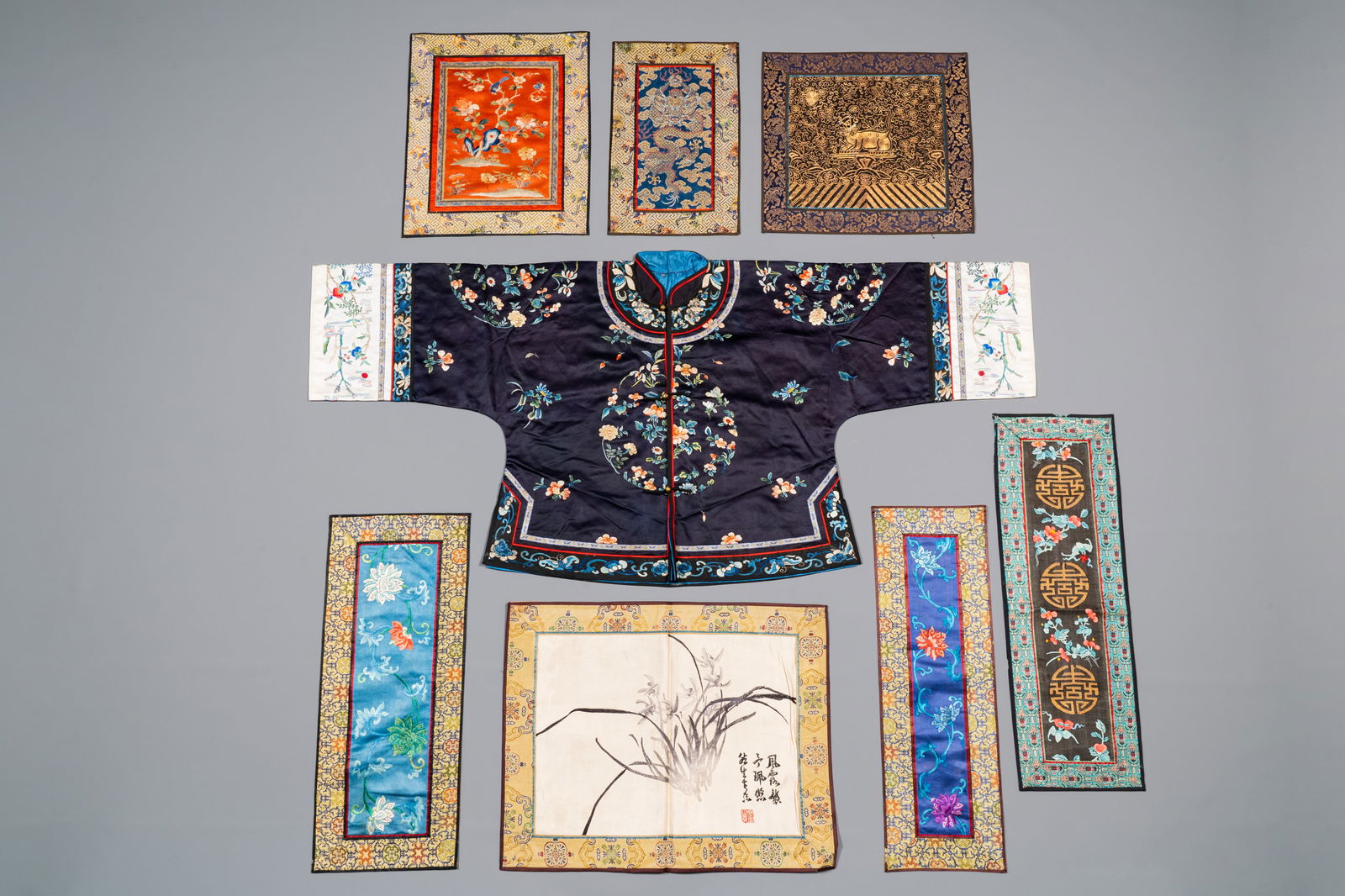 A group of eight pieces of Chinese embroidered silk, 19/20th C. (1 of 8)