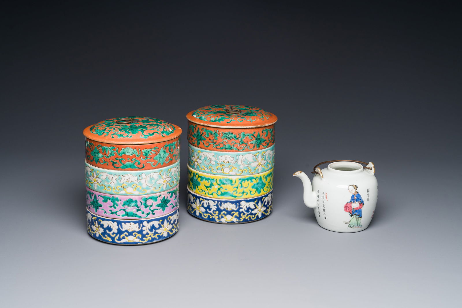 A pair of Chinese famille rose four-tier stacking box and a teapot, 19th C. (1 of 4)