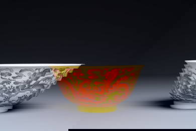 A rare Chinese yellow-ground iron-red decorated 'dragon' bowl, Qianlong mark and of the period