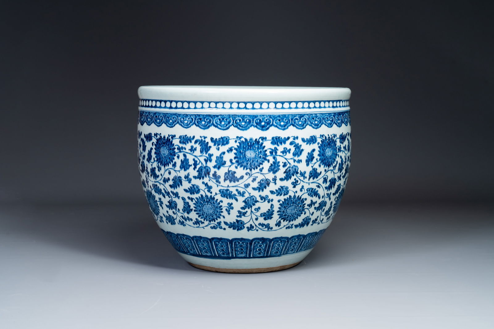 A large Chinese blue and white 'peony scroll' fish bowl, Qianlong/Jiaqing (1 of 5)