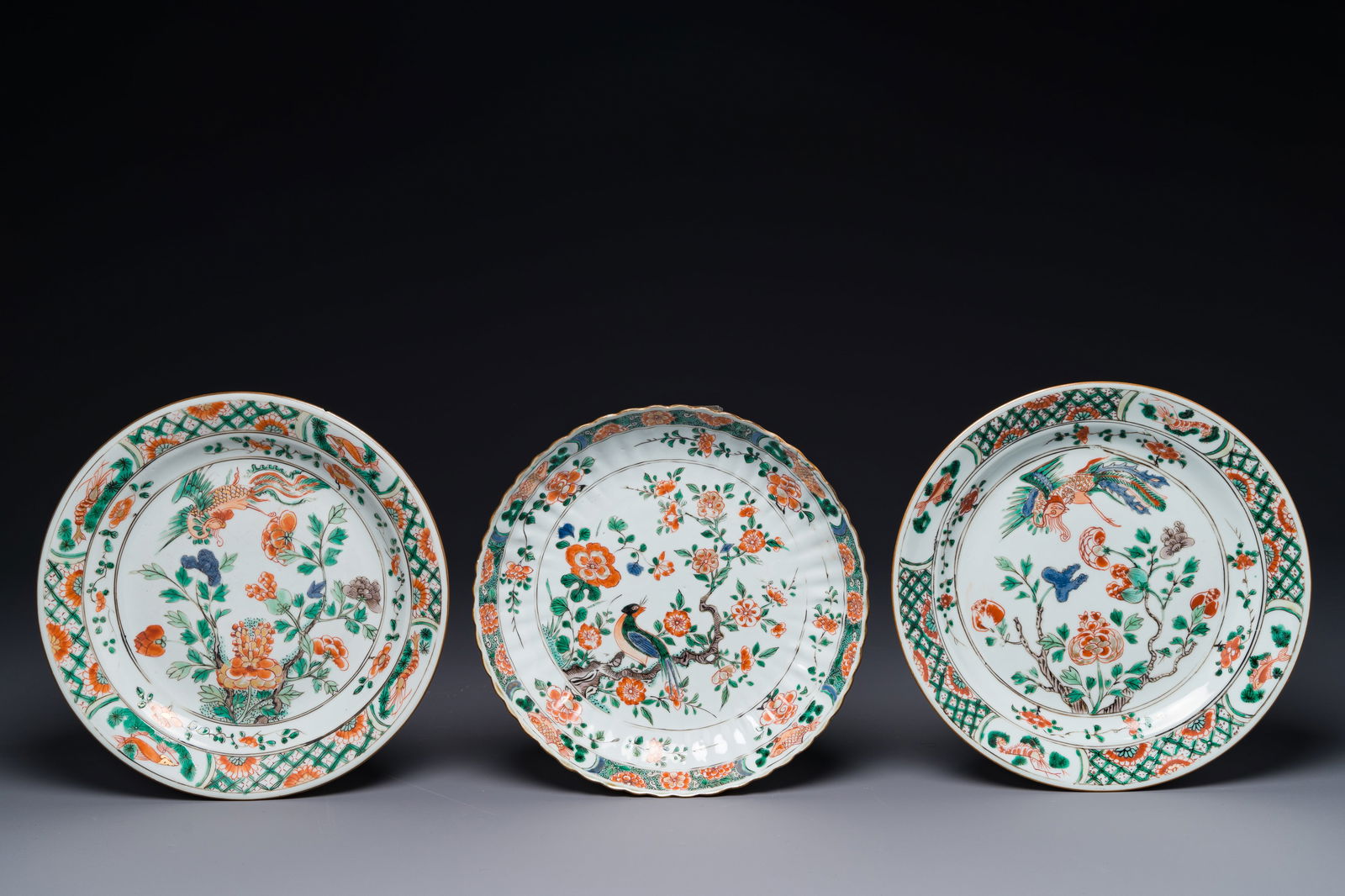 Three Chinese famille verte 'phoenix and peony' plates, Kangxi (1 of 2)