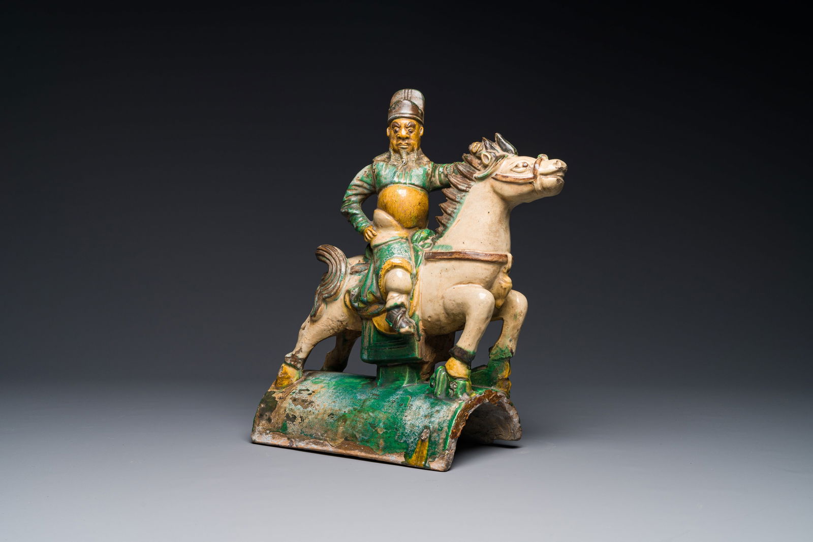 A Chinese sancai roof tile in the shape of a warrior on horseback, Ming (1 of 5)