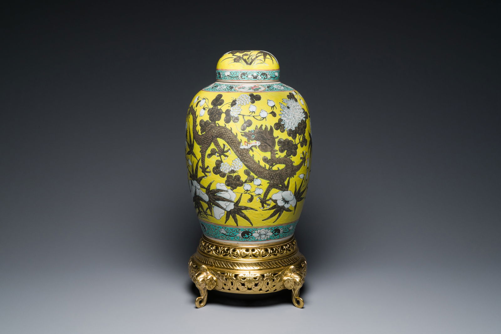 A large Chinese yellow-ground Dayazhai-style 'dragons' jar and cover on gilt bronze stand, 19th C. (1 of 9)