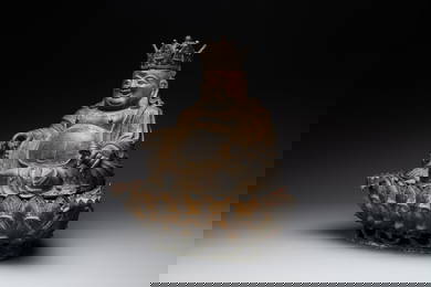 An important and large Chinese gilt bronze Buddha on a lotus throne, Ming