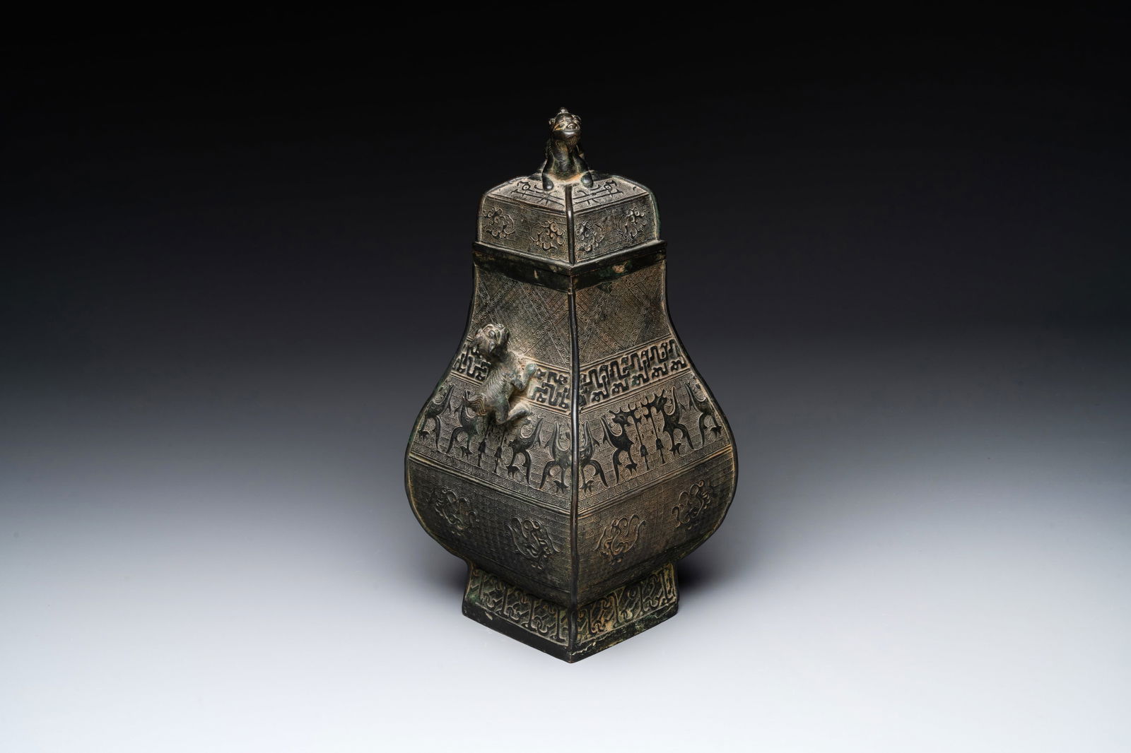A Chinese archaistic bronze ritual wine vessel and cover in Western Zhou-style, 'fang hu __', Ming: A Chinese archaistic bronze ritual wine vessel and cover in Western Zhou-style, 'fang hu ', Ming H.: 34 cm Weight.: 3855 grams