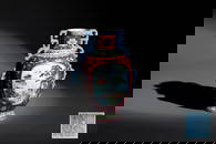 A fine Chinese famille rose ruby-sgraffito-ground 'Hai Wu Tian Shou' vase with 'chilong' handles,