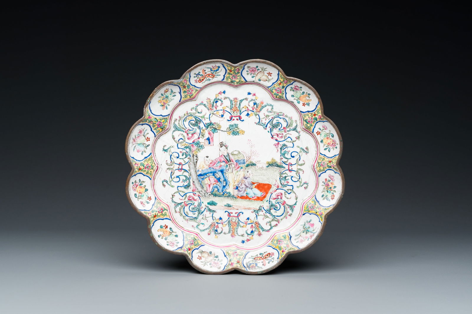 A lobed Chinese Canton enamel plate with a lady and two boys in a garden, Yongzheng (1 of 2)